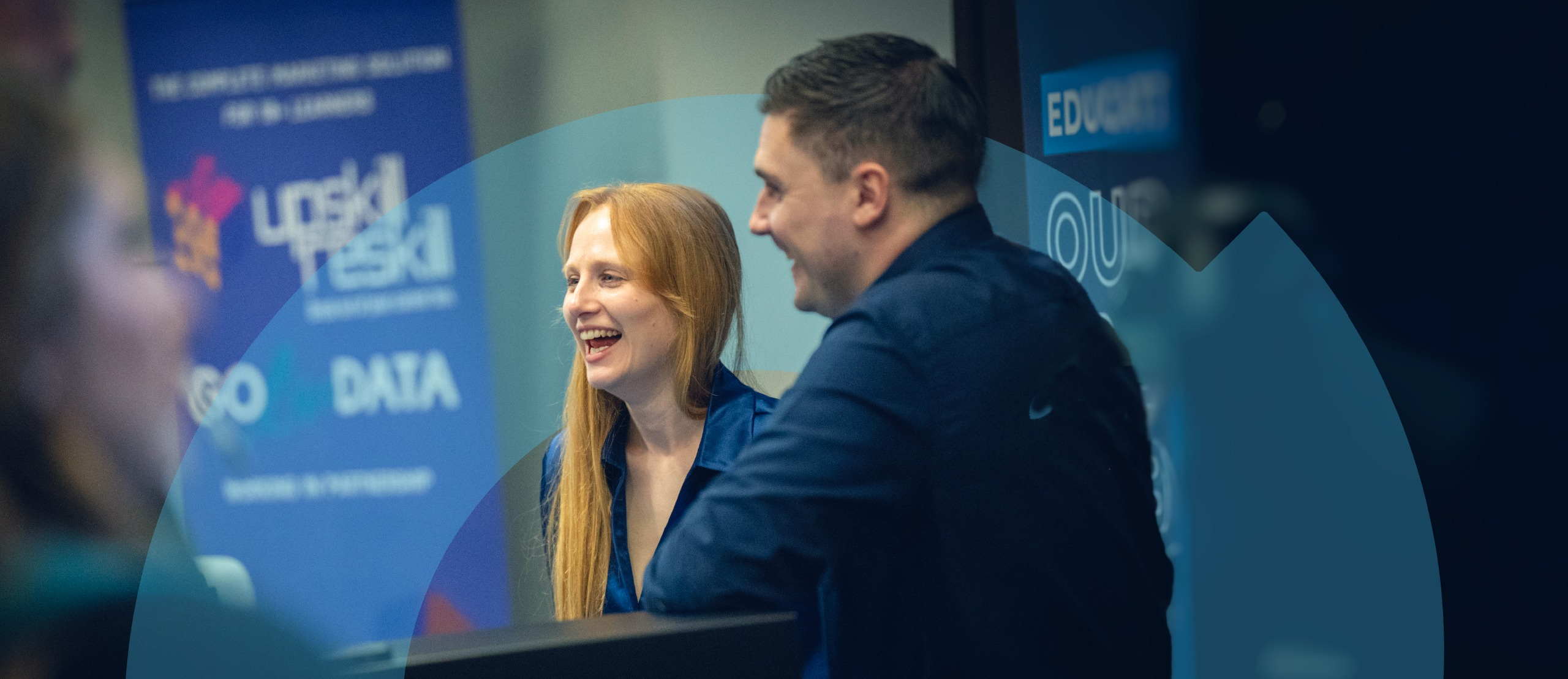 Dan and Vicky exhibiting at a conference